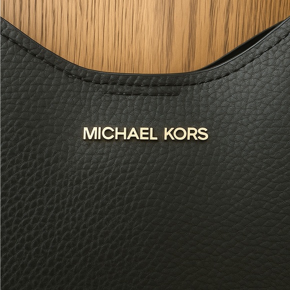 Michael Kors Nolita Small Hobo
Shoulder/Crossbody Bag - Picture 3 of 6